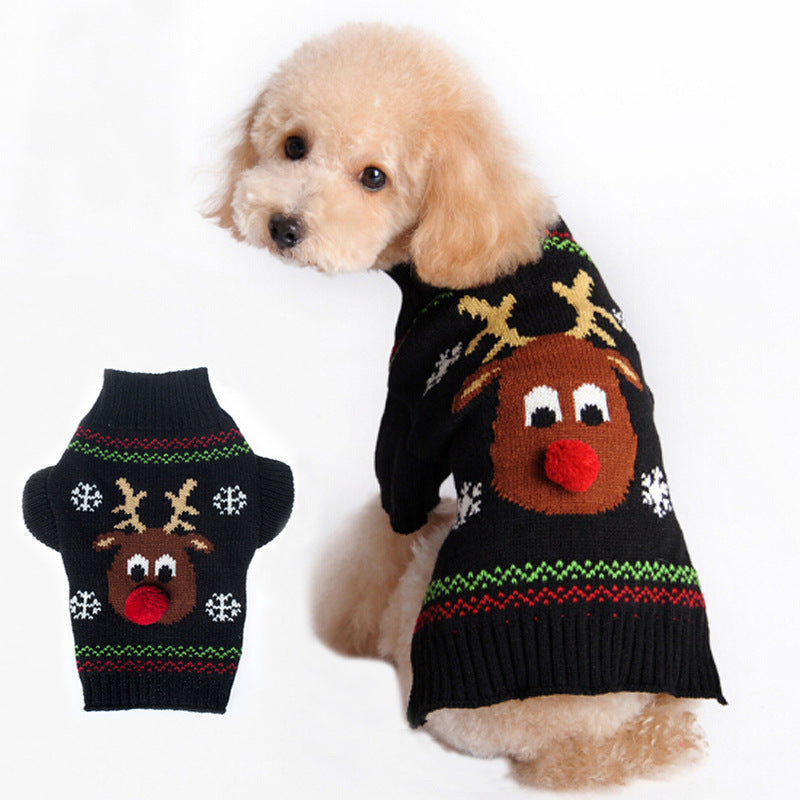 Apricot poodle wearing a black Rudolph Christmas sweater next to the sweater laid flat