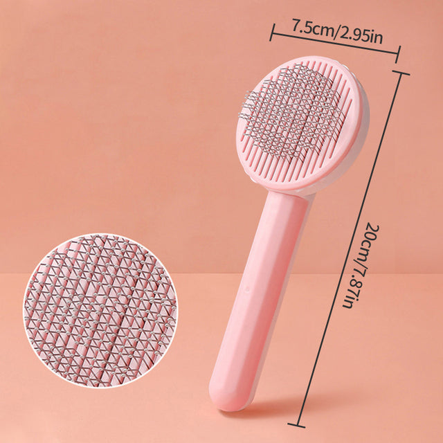 Self-cleaning slicker brush retraction button feature
