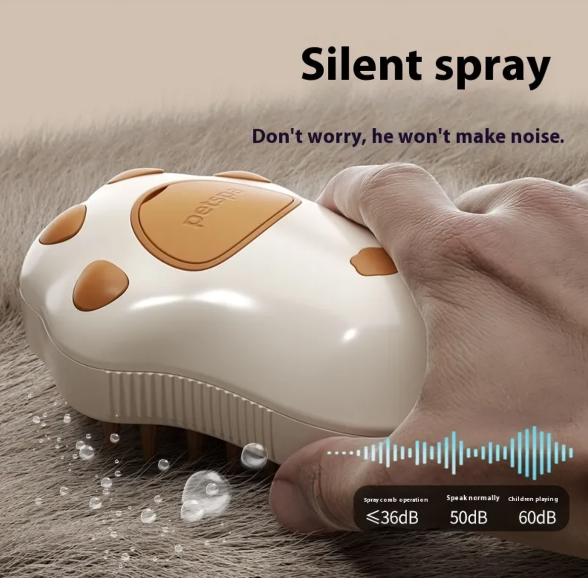Quiet paw-shaped spray grooming comb held in hand, noise levels 36 dB to 60 dB – TailoraStyle