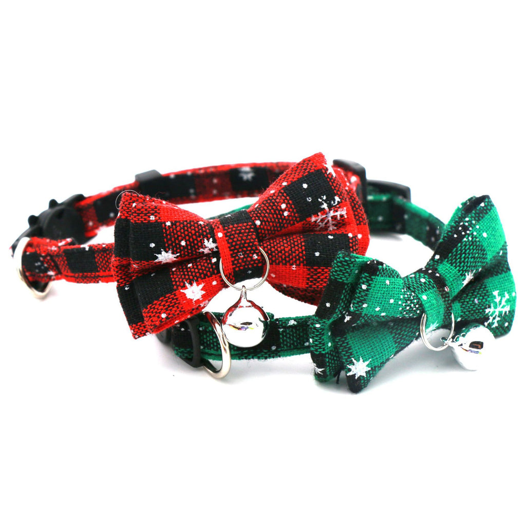 Two Christmas cat collars with bow ties and bells, red and black buffalo check and green and black plaid