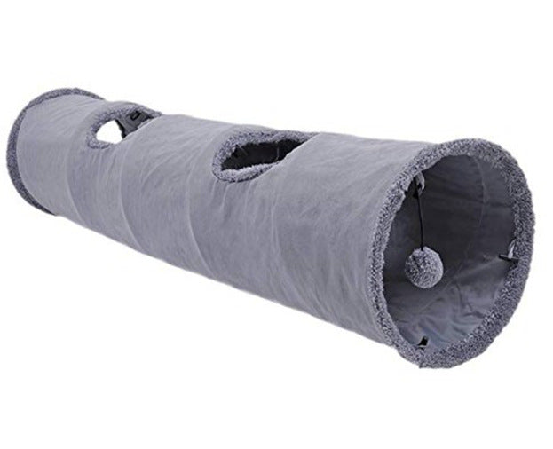 Long grey suede-touch cat tunnel with peek holes and a hanging pom-pom toy inside