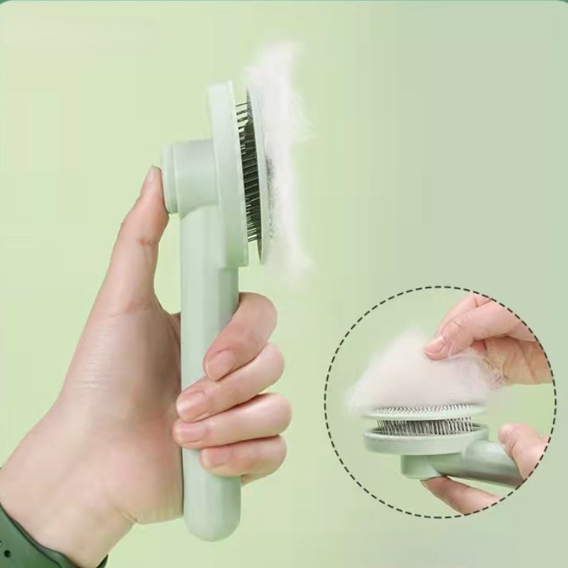 Dog being groomed with self-cleaning slicker brush