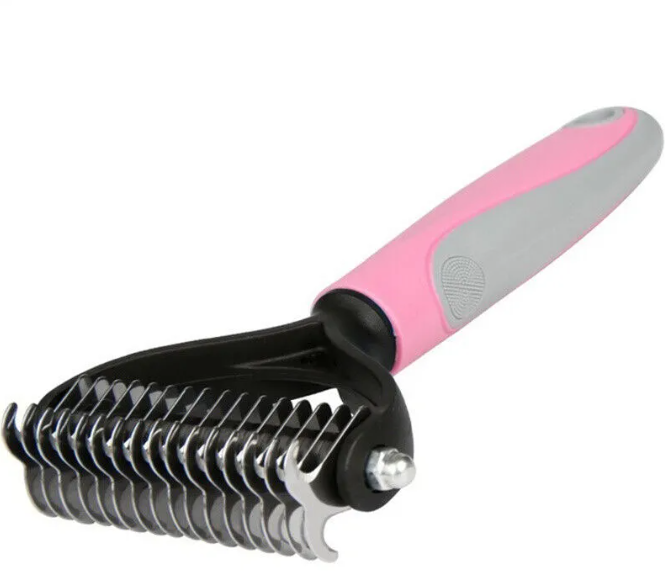 Loose fur removed by pet deshedding grooming brush