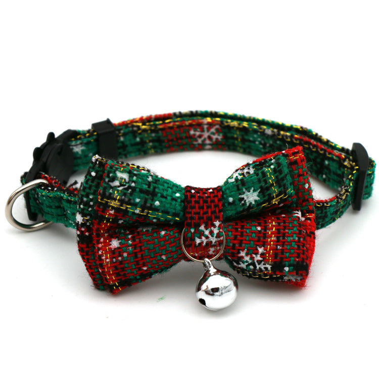Dark green and red patterned Christmas cat collar with snowflake bow tie and silver bell
