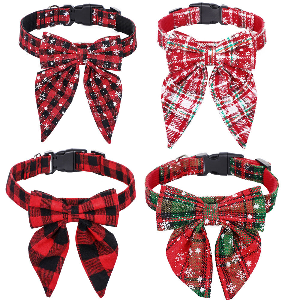 Four Christmas dog collars with bow ties in red buffalo check, tartan and snowflake plaid designs